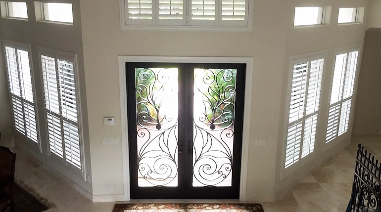 Miami foyer with glass doors and plantation shutters